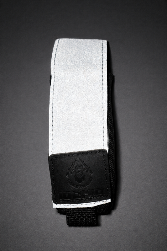 Šviesą atspindintis turniketo dėklas