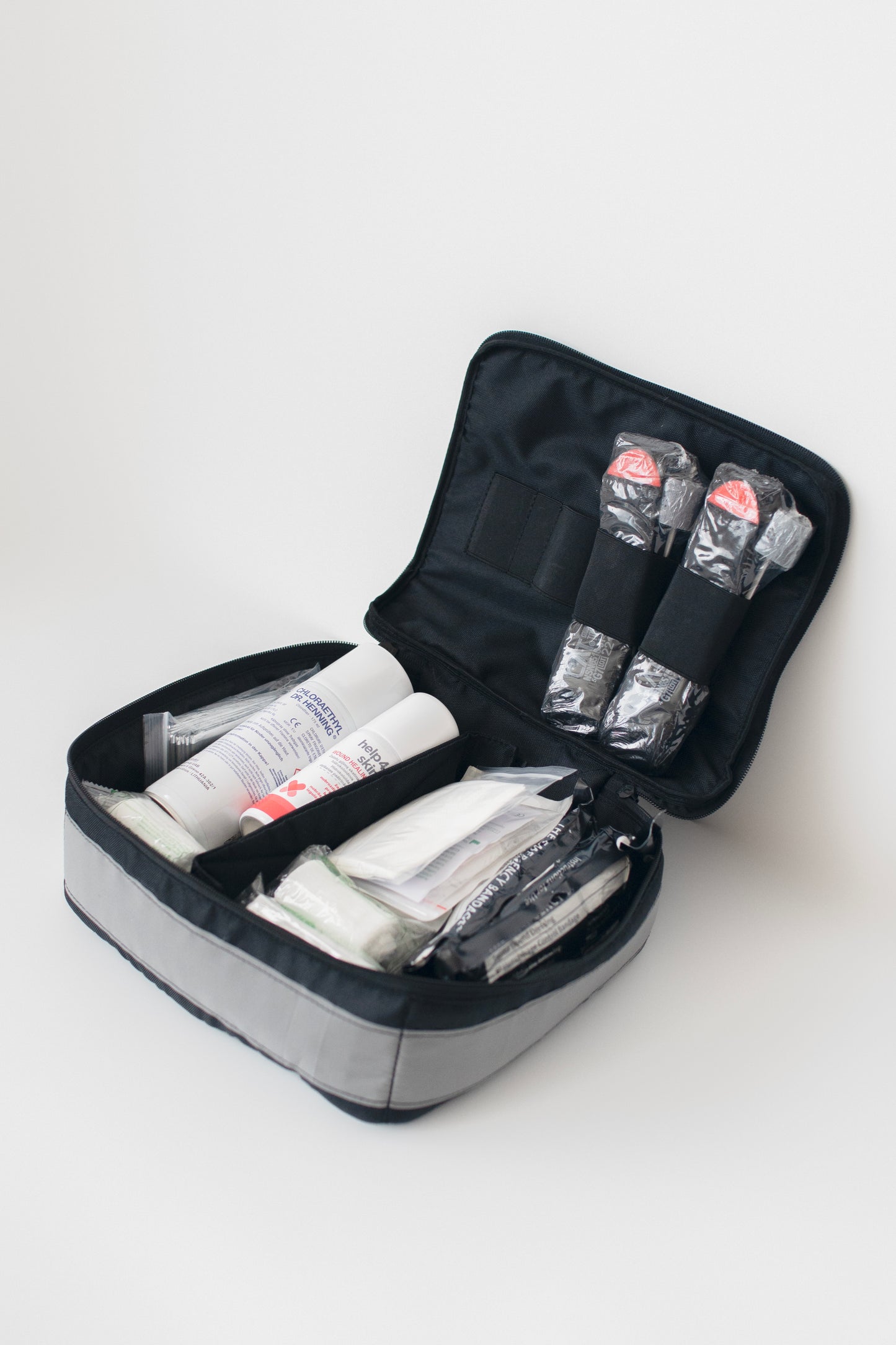 Pirmosios pagalbos rinkinio dėklas