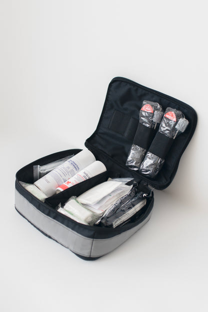 Pirmosios pagalbos rinkinio dėklas